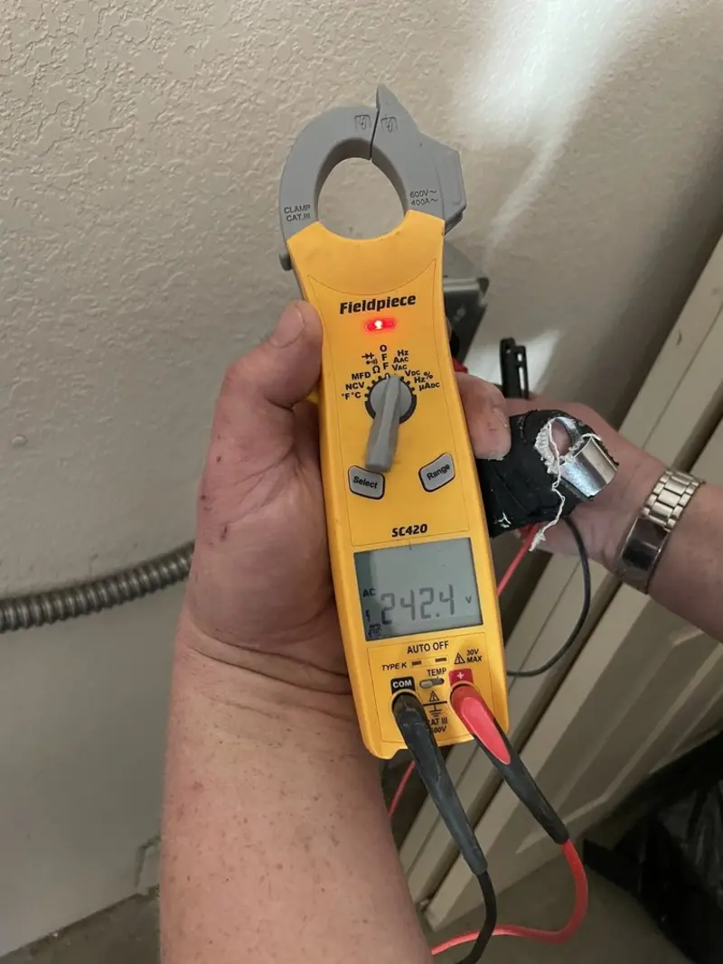 Voltage testing with clamp meter during Hot Tub / Pool Electrical Wiring in Yukon